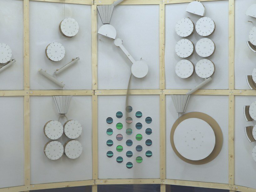 whirring panels animate pinaffo & pluvinage's cardboard installation, powered solely by sand 