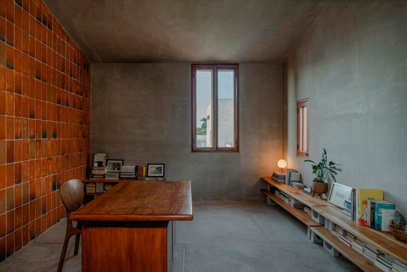 red bricks introduce thermal mass to the south-facing wall of the office addition