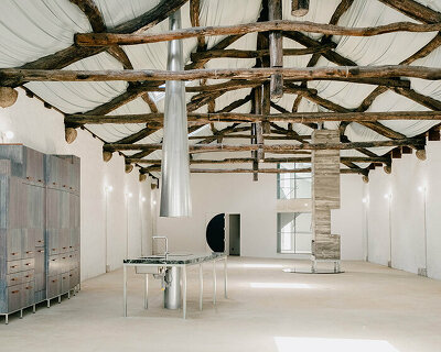 fala atelier transforms former warehouse into 'the house of many faces' in portugal