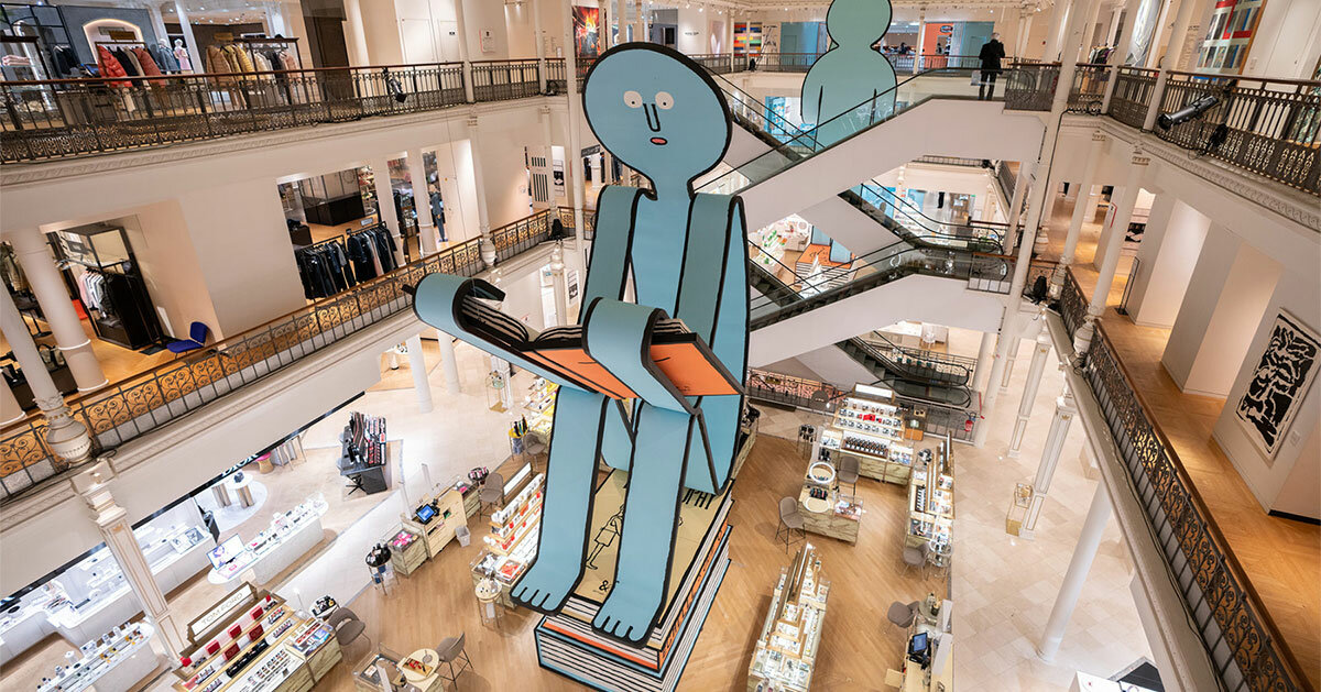 jean jullien's paper people land at le bon marché for book-themed