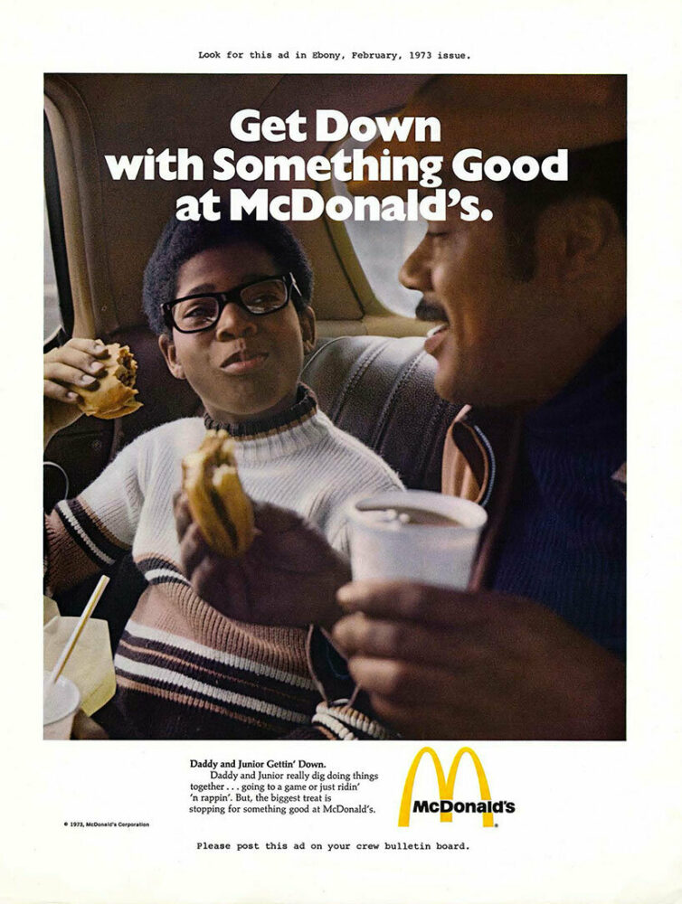 McDonald’s advertisement, Daddy and Junior Gettin’ Down. Emmett McBain, 1973 | Emmett McBain 1973. Reproduced with kind permission of Letta McBain. Courtesy of the Emmett McBain Afro-American Advertising Poster Collection, National Museum of American History, Smithsonian Institution