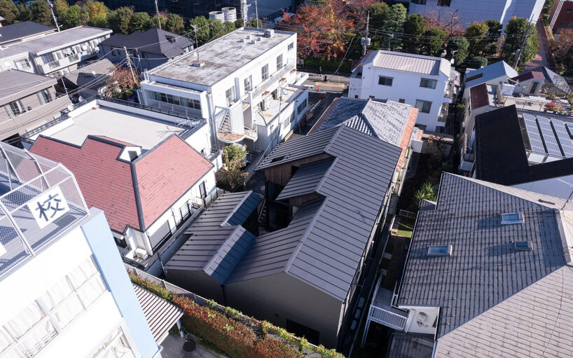 staggered volumes in love architecture's tokyo residential complex ensure privacy & ample light