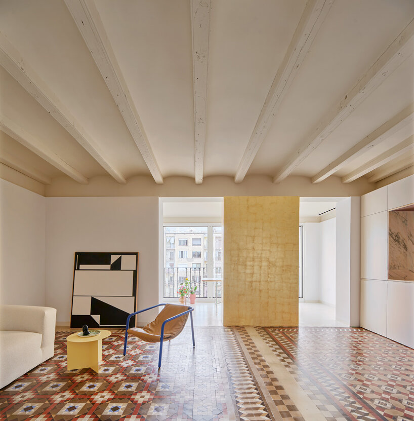 metal-clad fronts guide residents through raúl sánchez's rosegold apartment in spain