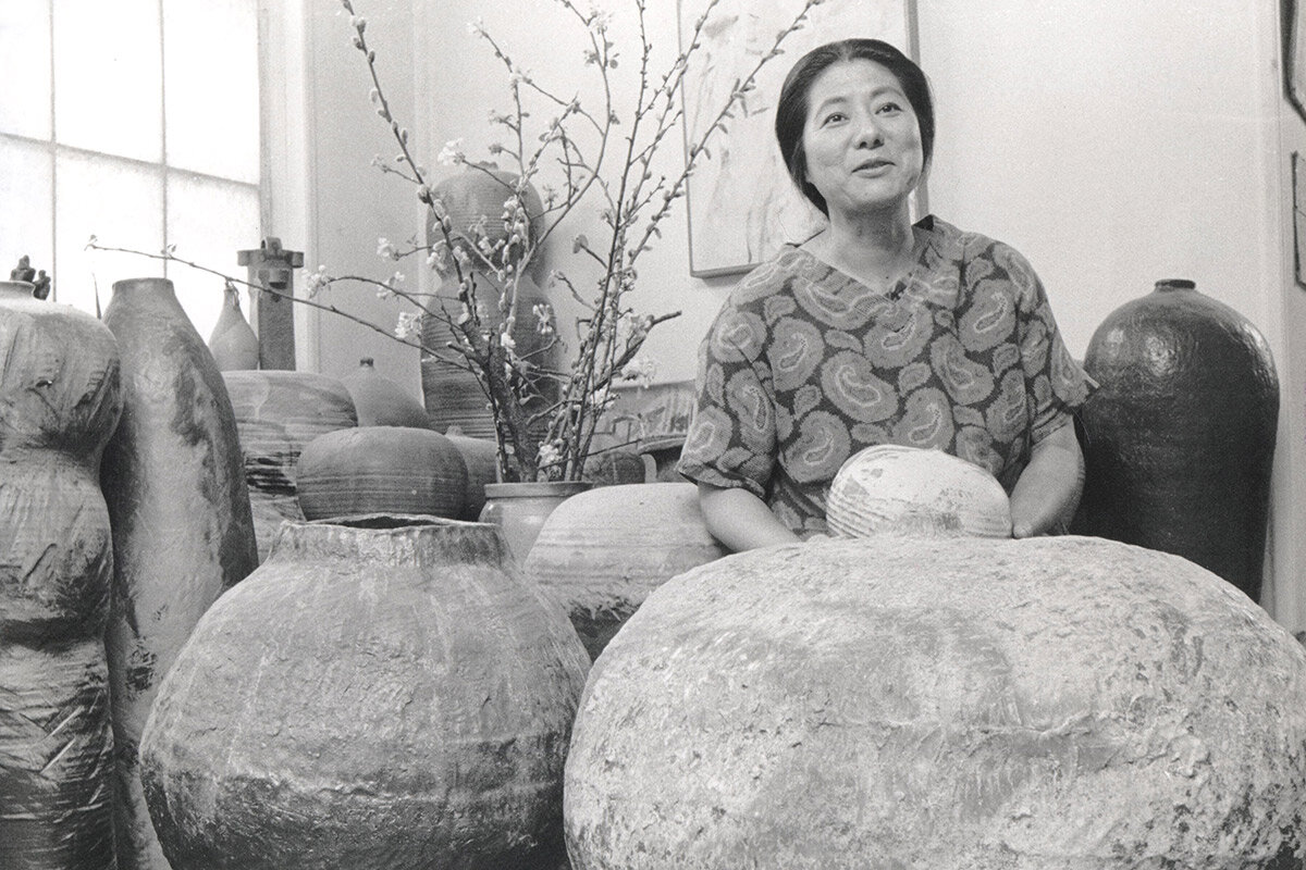 Toshiko Takaezu with work in her Clinton, New Jersey, studio, c. 1965. Toshiko Takaezu Archives. © Family of Toshiko Takaezu