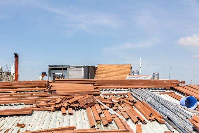 the existing building’s composite wood bar on the roof