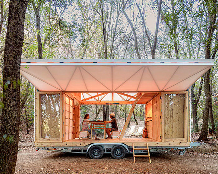 self-sufficient mobile home made of dowel-laminated timber rides on wheels