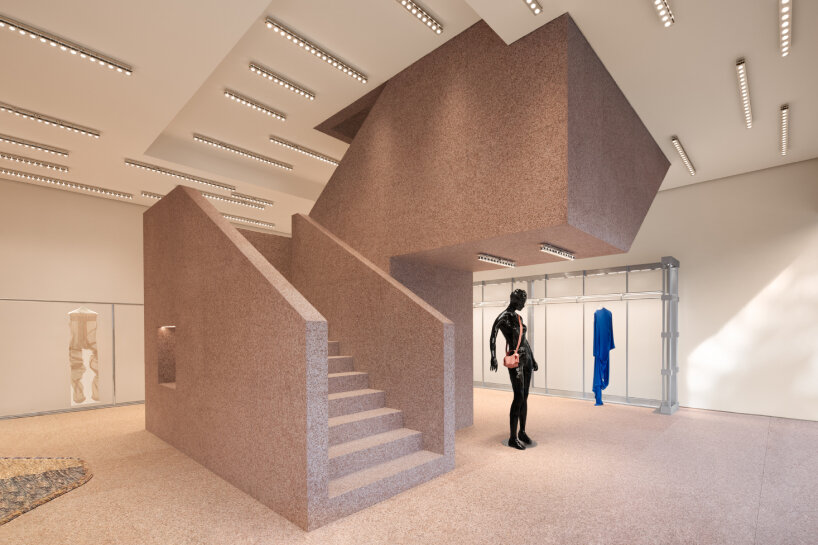 acne studios' signature flamed pink granite envelops beijing sanlitun flagship store