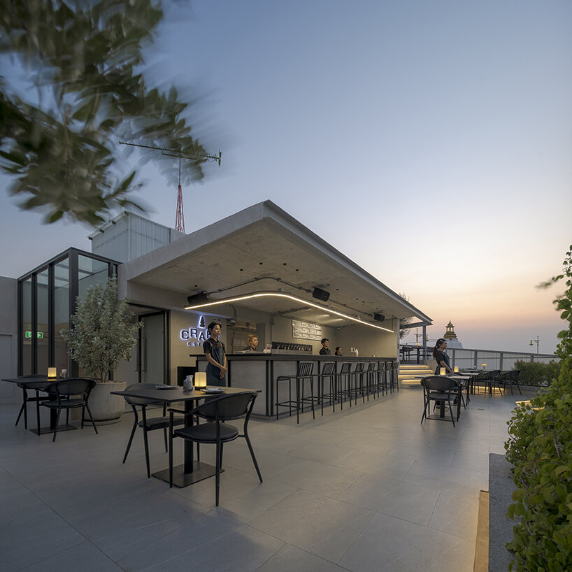 the restaurant hosts a stepped rooftop for socializing