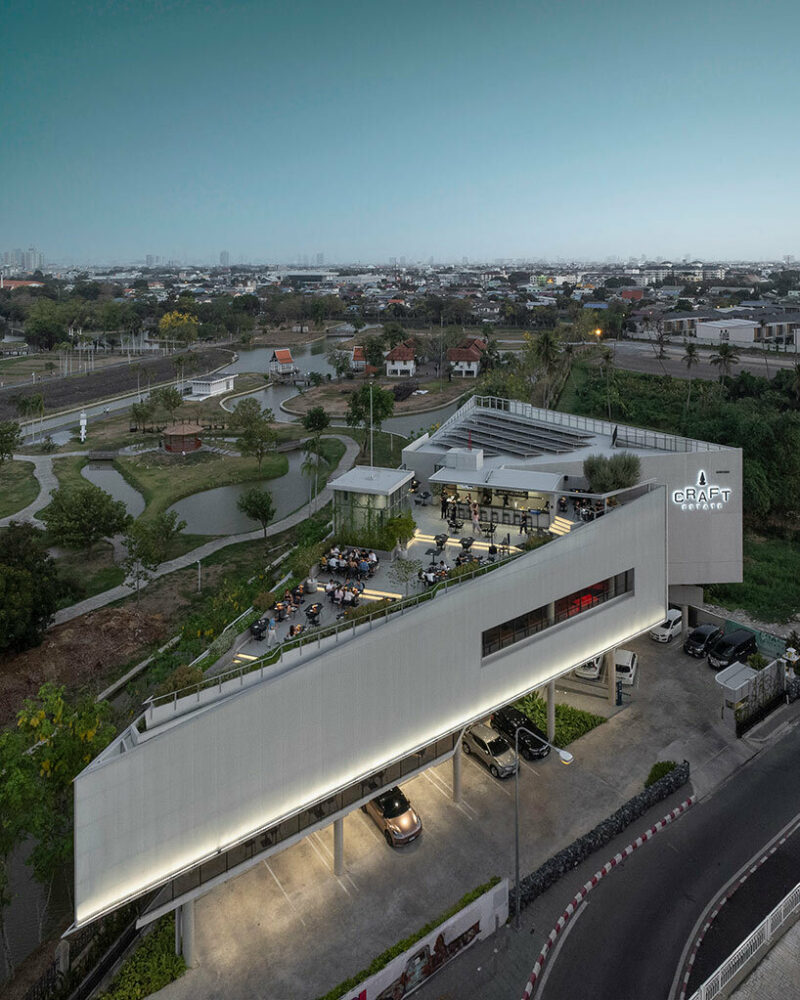 a triangle-shaped building by ASWA in Nonthaburi, Thailand hosts the Craft Estate