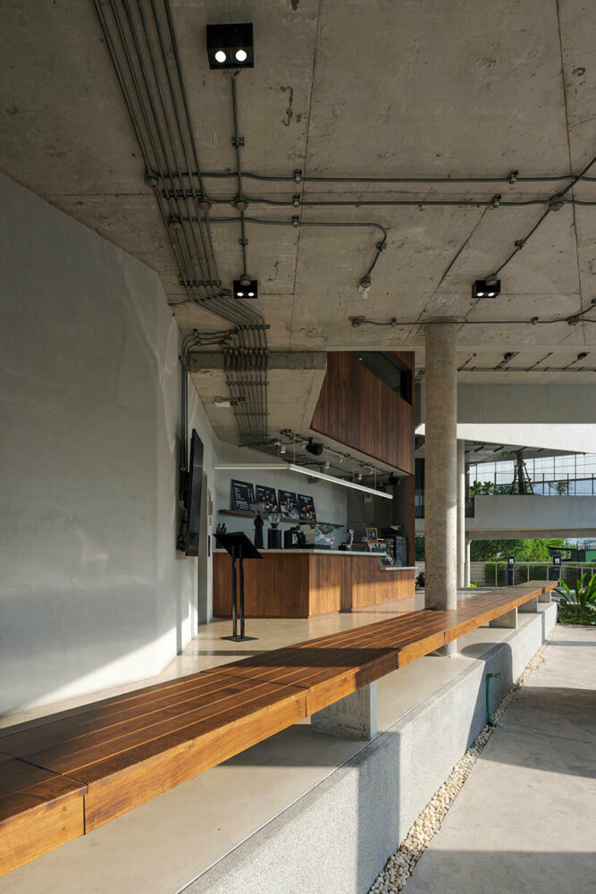 the three-story height office space is located on the opposite side of the restaurant 