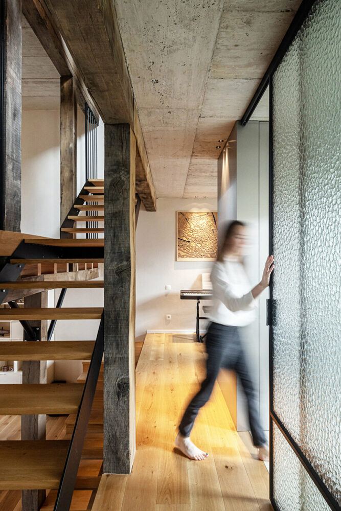 materials like oak, steel, and concrete promote tranquility throughout the project