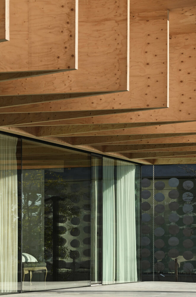 the house offers a visually intriguing and functional architectural solution