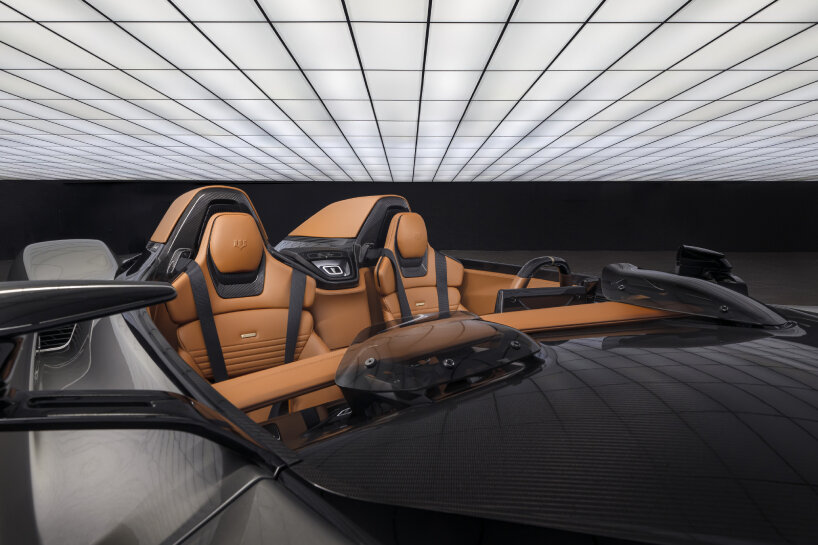 in B95 Gotham, tan leather with tan stitching and quilting in the center panels greet the driver and passenger