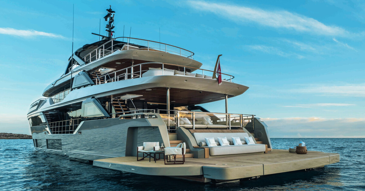 inside custom line navetta 38 yacht with leather walls, raffia