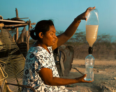 these biodegradable caps transform any PET bottle into a portable water filtration system