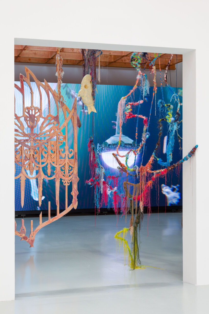 wiry sculptures and intricate threads unravel across french pavilion at venice art biennale