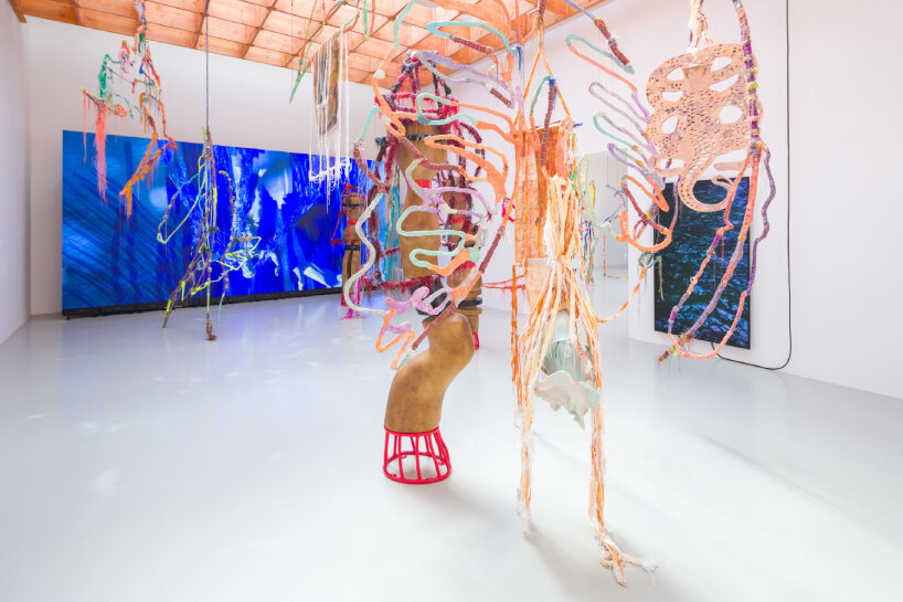 wiry sculptures and intricate threads unravel across french pavilion at venice art biennale