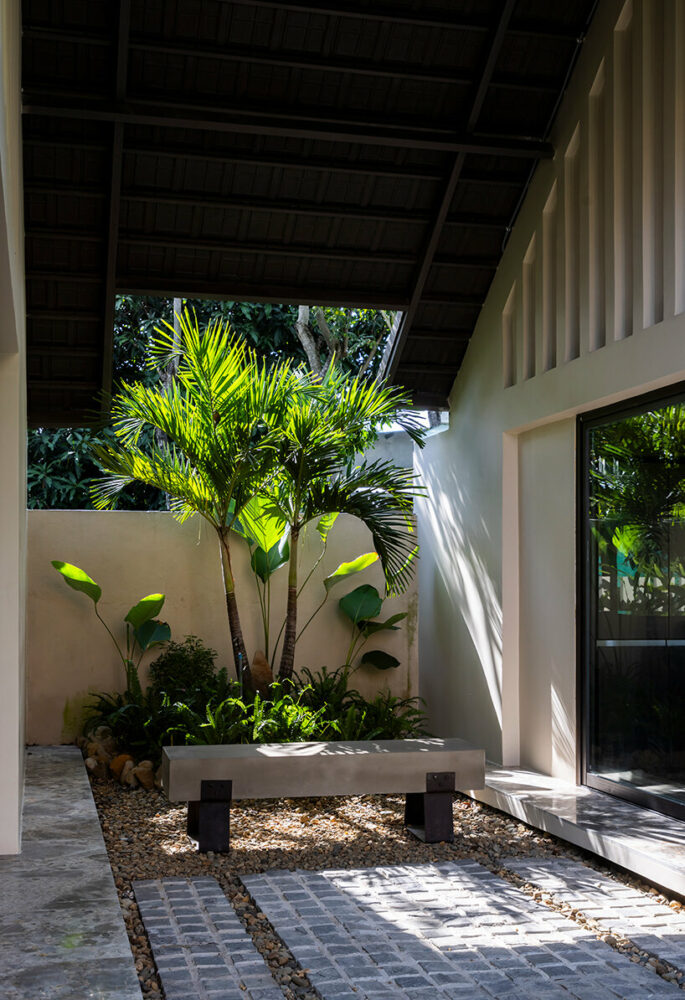 natural stone features are used throughout, including bathrooms and gardens