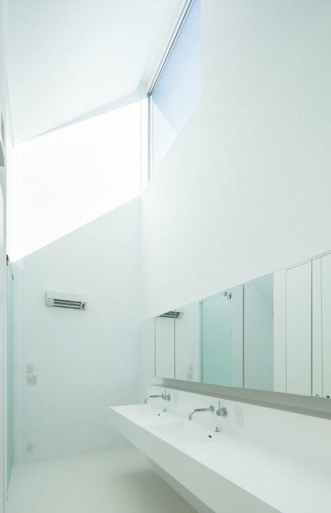 even utilitarian spaces like the bathroom are infused with light