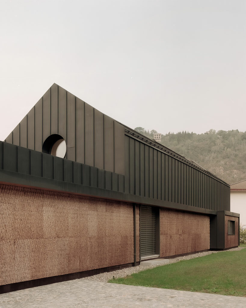 cork-covered border house by LCA architetti showcases sustainable solutions in italy