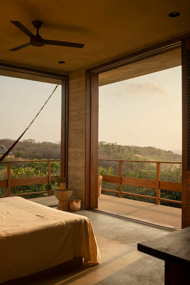 the rooms provide views of the regional vegetation and the sea