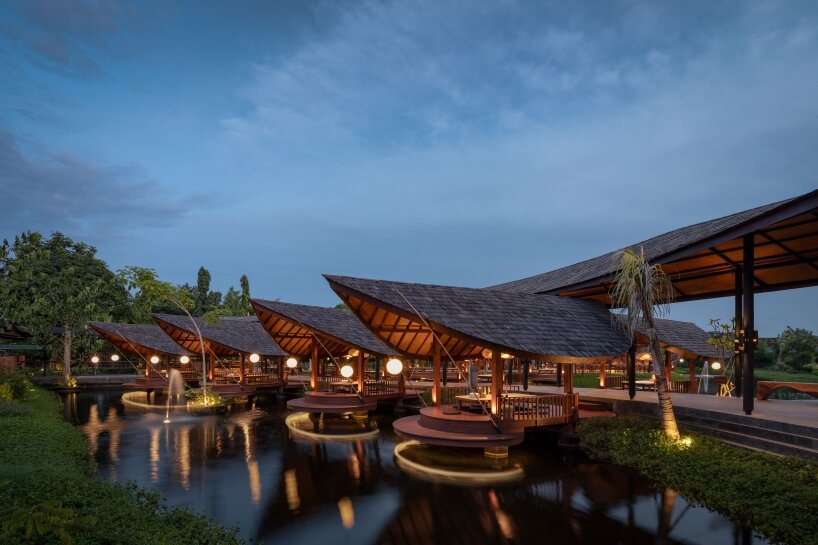 the main dining areas have access to the lake's edge, allowing guests to interact with the waterscape