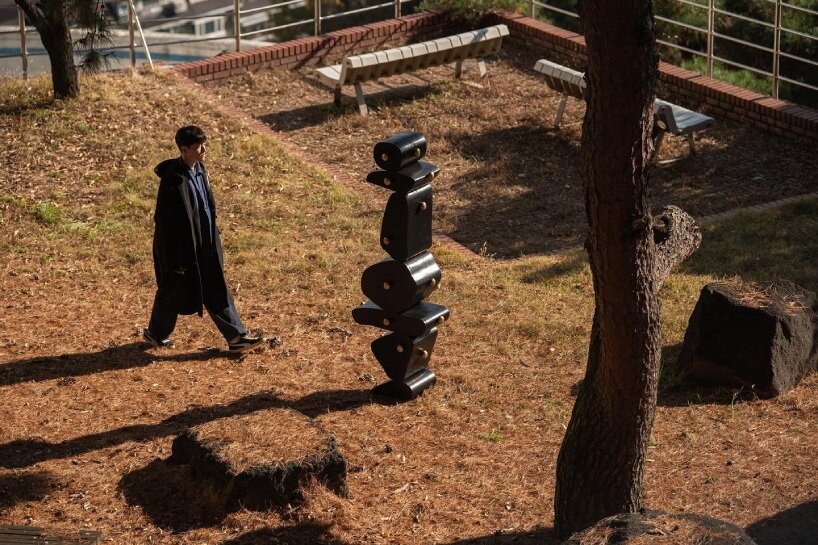 irregularly stacked volumes capture the korean tradition of wish-making in jaewoo ahn's wooden cabinet