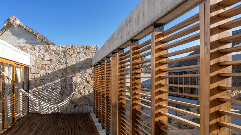 the pavilions feature private terraces facing the botanical garden