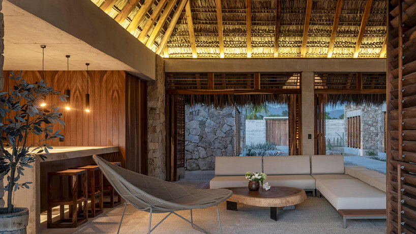 the central pavilion houses the public and social spaces