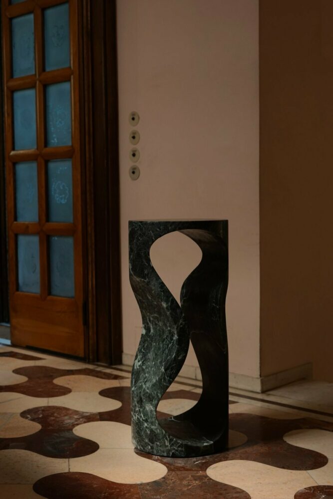 Hourglass pedestal by Johan Wilén in Verde Alpi marble from Italy