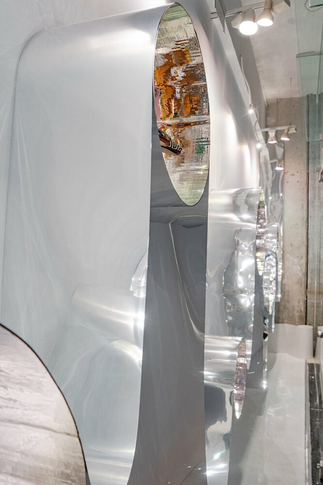 the Upper Zone is brightly lit, creating vibrant reflections that draw attention