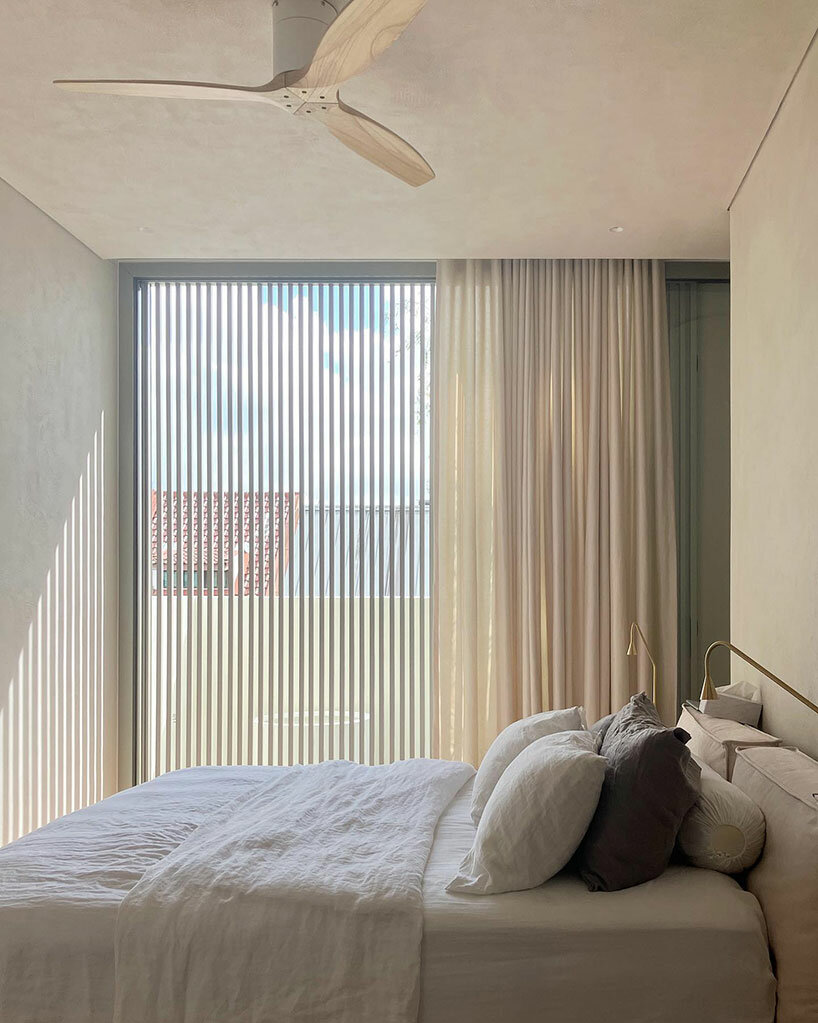 double-height windows encourage interior ventilation 