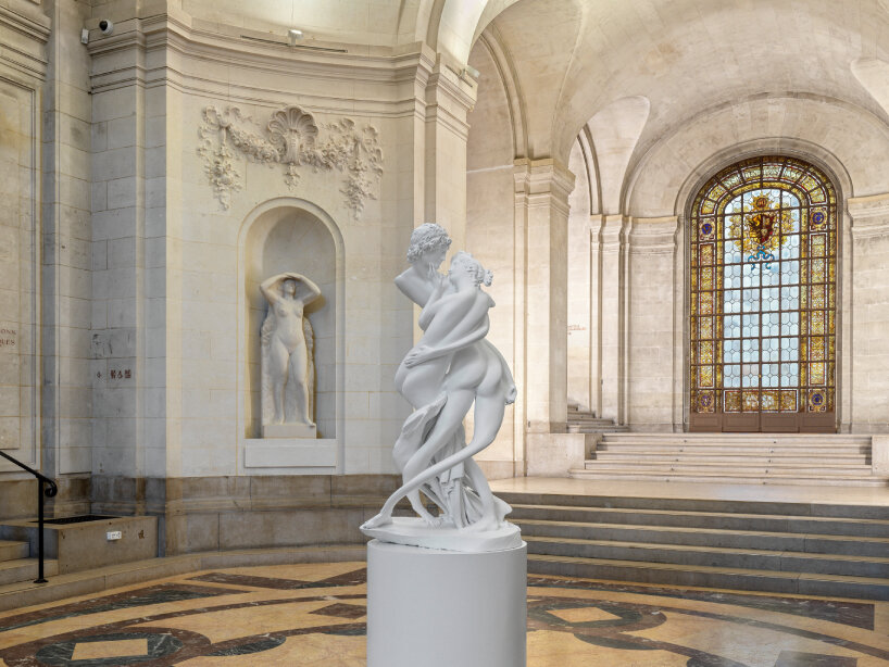 wim delvoye intertwines historic museum artifacts with his whimsical sculptures in geneva