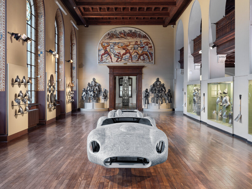 wim delvoye intertwines historic museum artifacts with his whimsical sculptures in geneva