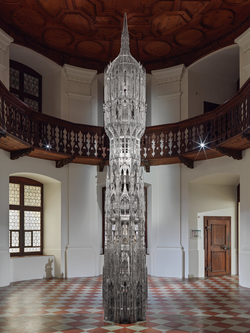 wim delvoye intertwines historic museum artifacts with his whimsical sculptures in geneva