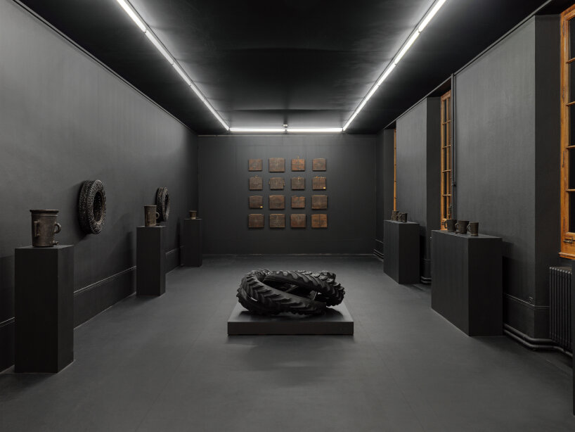 wim delvoye intertwines historic museum artifacts with his whimsical sculptures in geneva