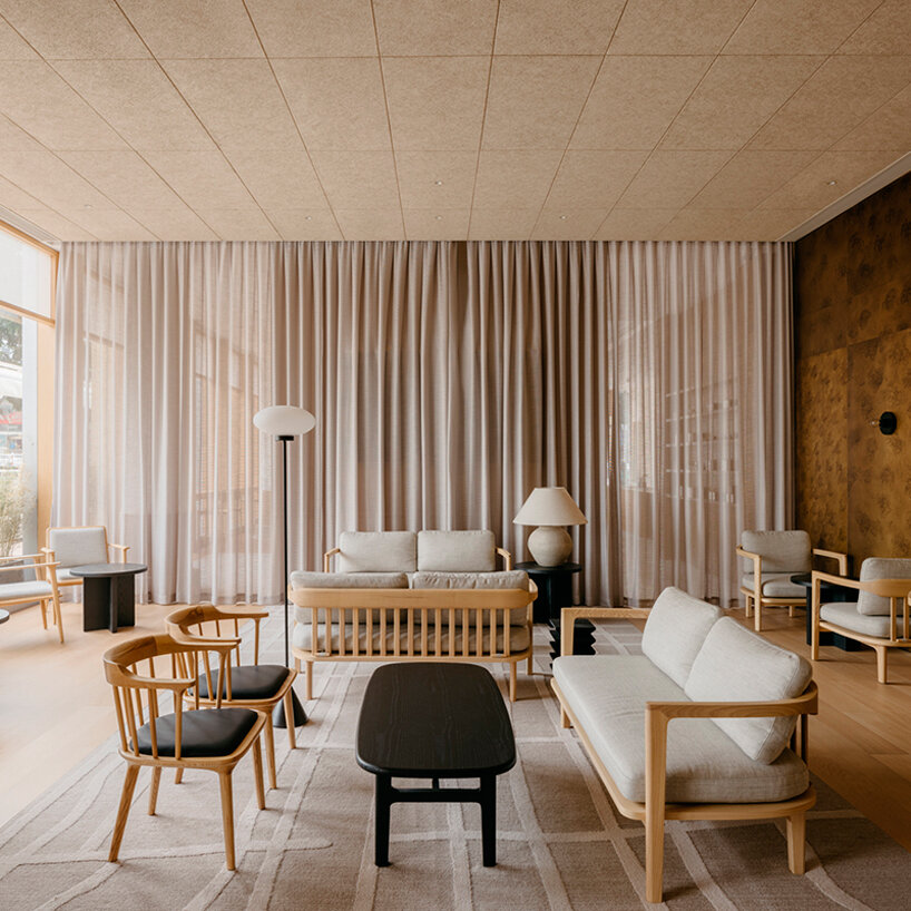 oversized furniture elements create a seamless transition between the courtyard and lounge