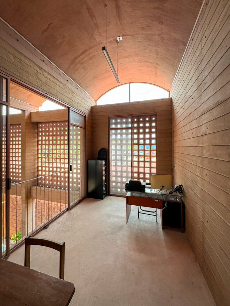 the second floor houses a meeting room, two offices, and the management office