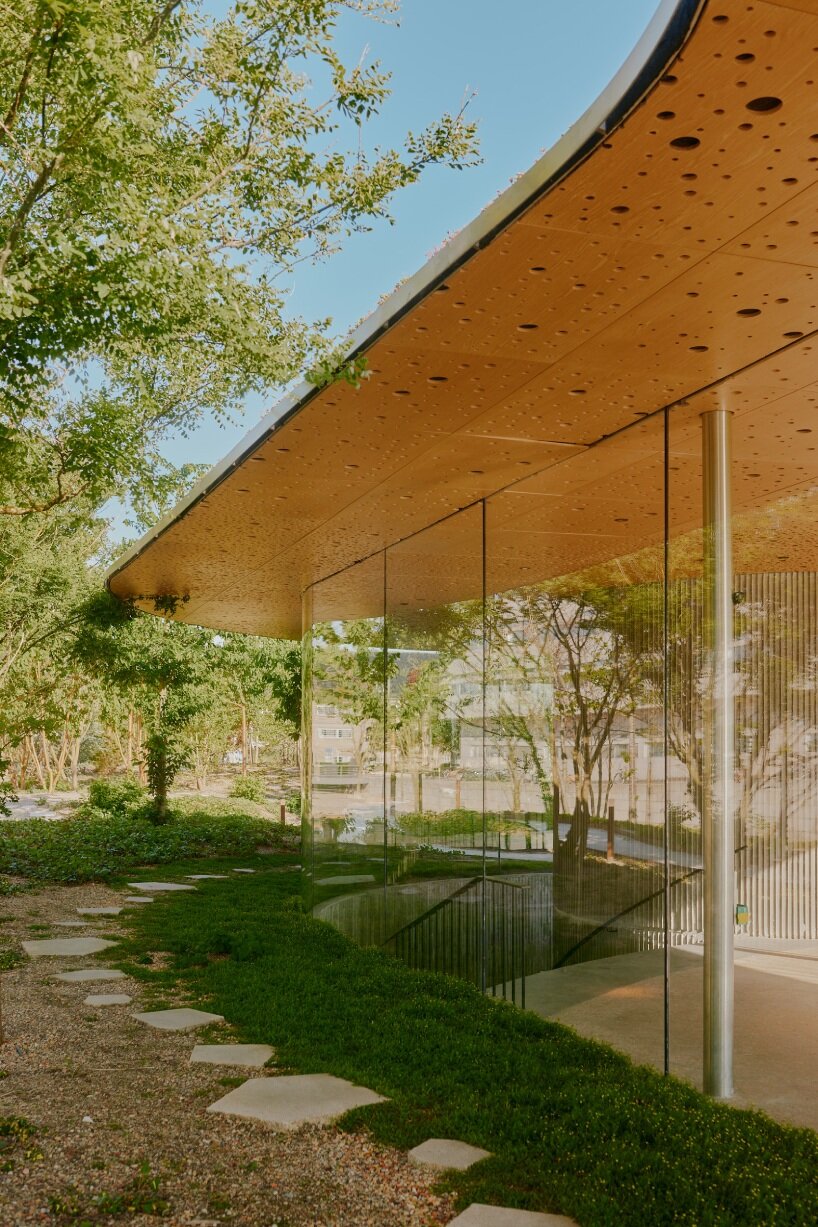 david altrath captures COBE's harborside oasis engulfed in biodiversity in copenhagen