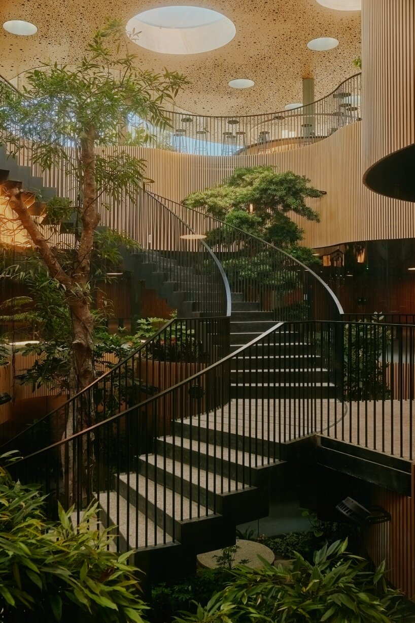 david altrath captures sweeping curves and verdant oasis of COBE's opera park, copenhagen