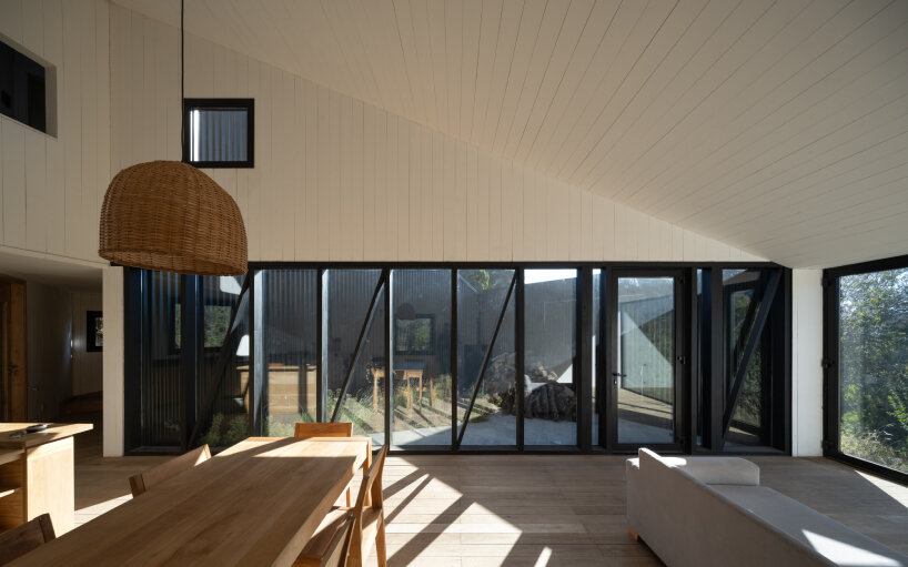moarqs fits self-sufficient house in argentina forest with solar and water-harvesting systems