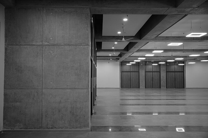 the exterior and interior material palette merges seamlessly, creating a cohesive design narrative