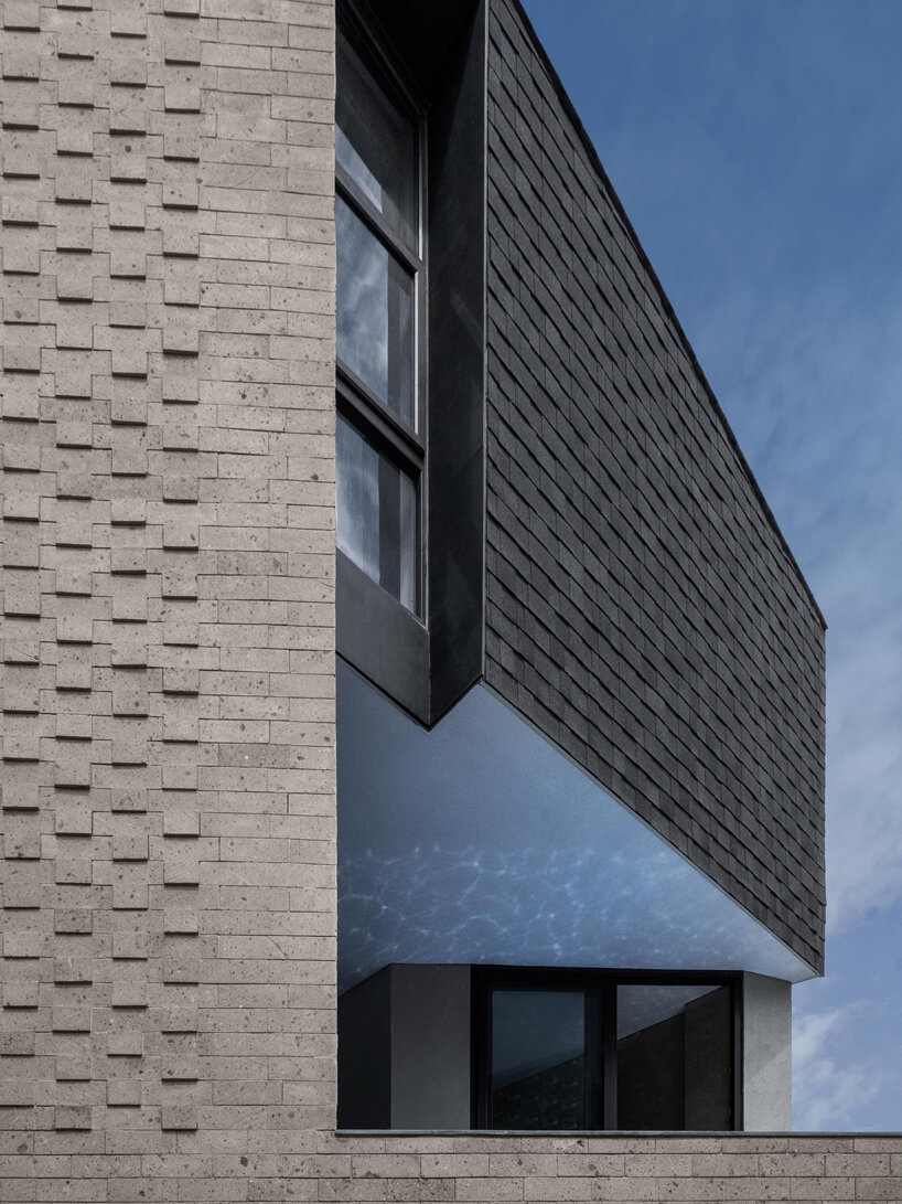 perforated adobe wall absorbs tropical heat to protect filipino residence