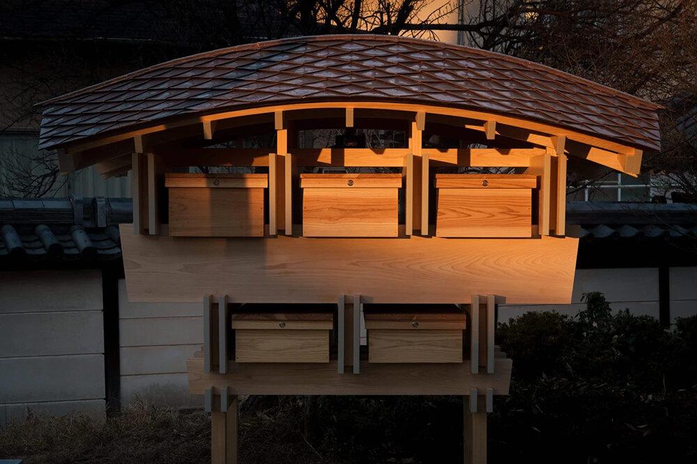 latticed roof crowns archtank's joint grave at myohoji temple, japan