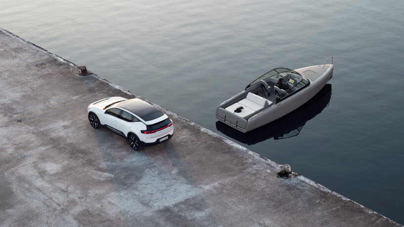 the electric hydrofoil boat's sleek body glints when the sunlight hits