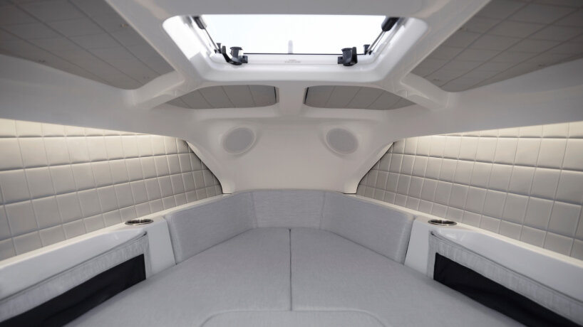 inside the Candela C-8 Polestar electric boat with gold hydrofoil