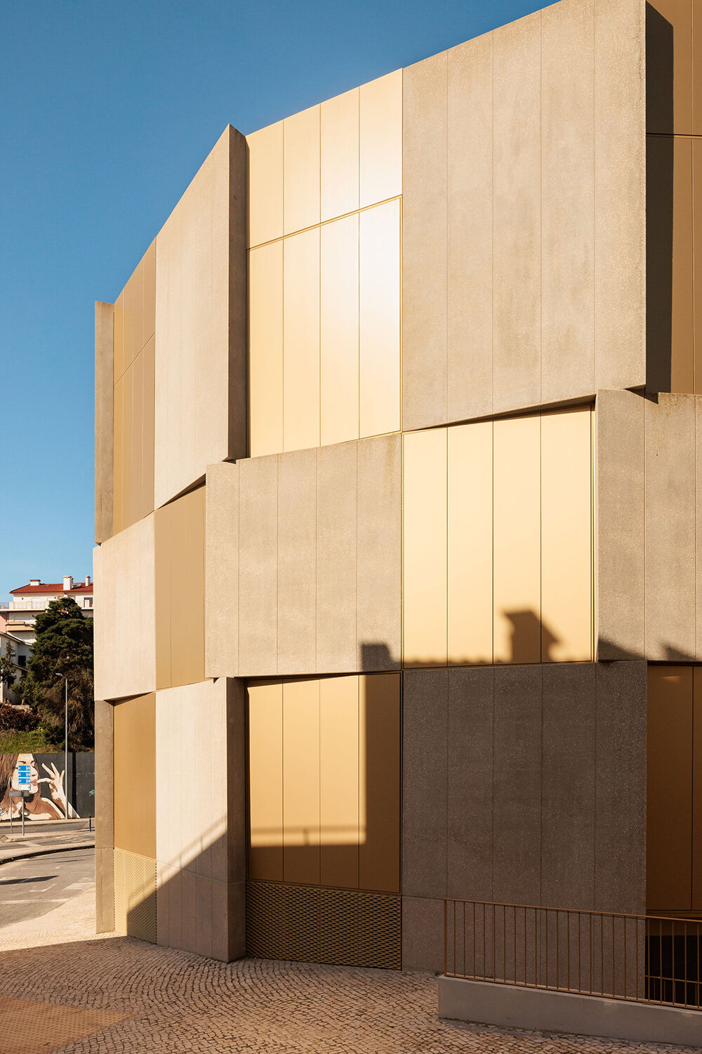 concrete panels with golden windows 