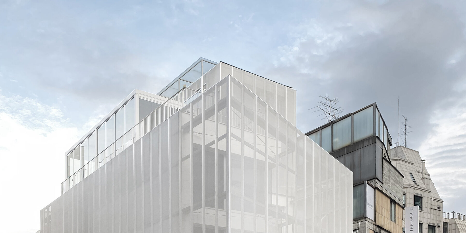 mesh-membrane-facades-archiworkshop-sinsa-s8-seoul-designboom-1800-2