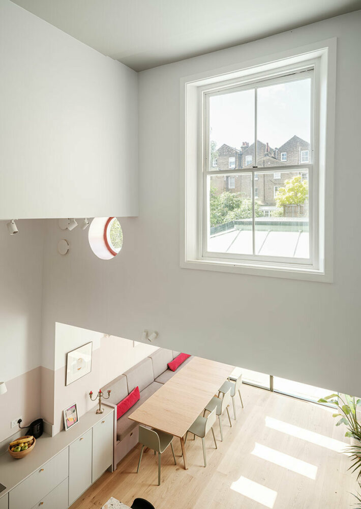 a bright and airy extension has transformed the spacial quality of the mid terrace house