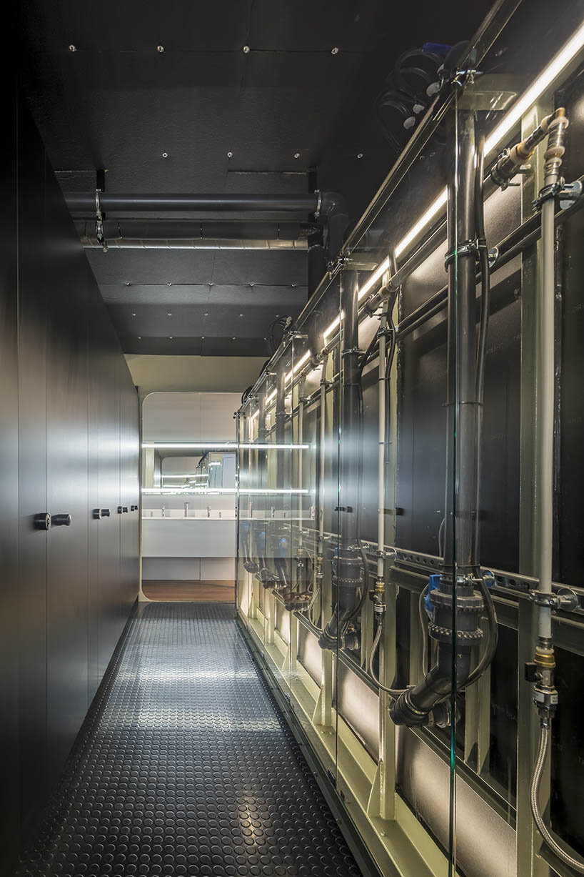 minimal enclosed spaces on the terrace rooftop allow for swimming in the rain or during cold winter nights